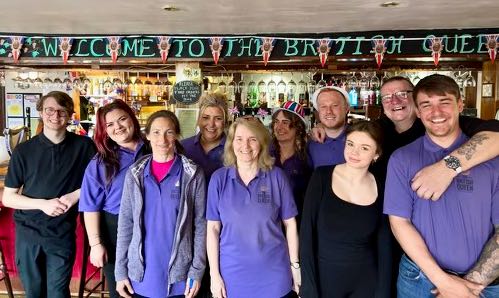 Bar staff at British Queen pub Willingdon