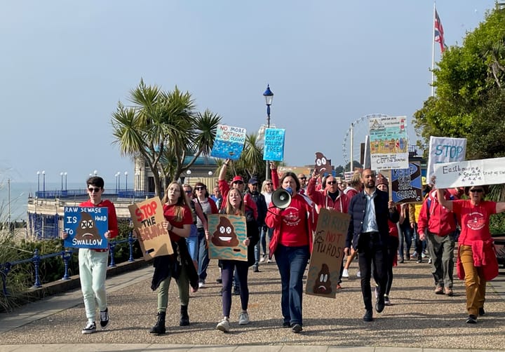 Coast lovers join sea swimmers in sewage protest march